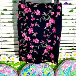 NYC&CO black skirt with pink embroidered floral design
